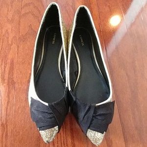 Gold glitter flats with black velvet bow